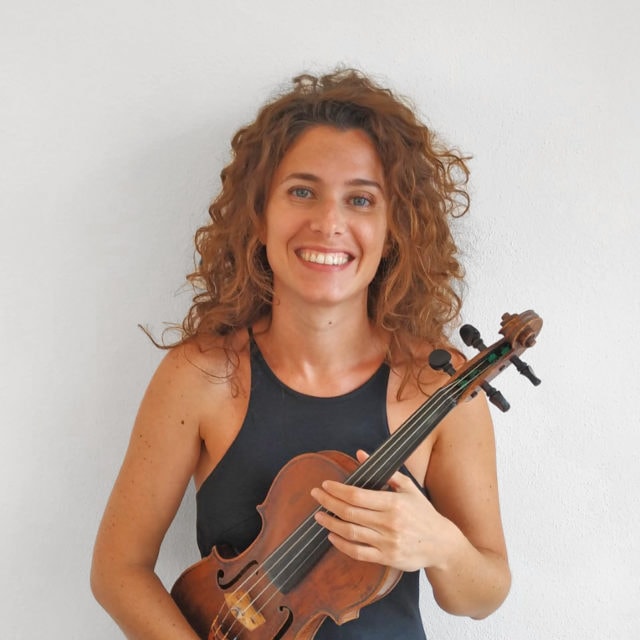Tania Mazzetti holds her violin
