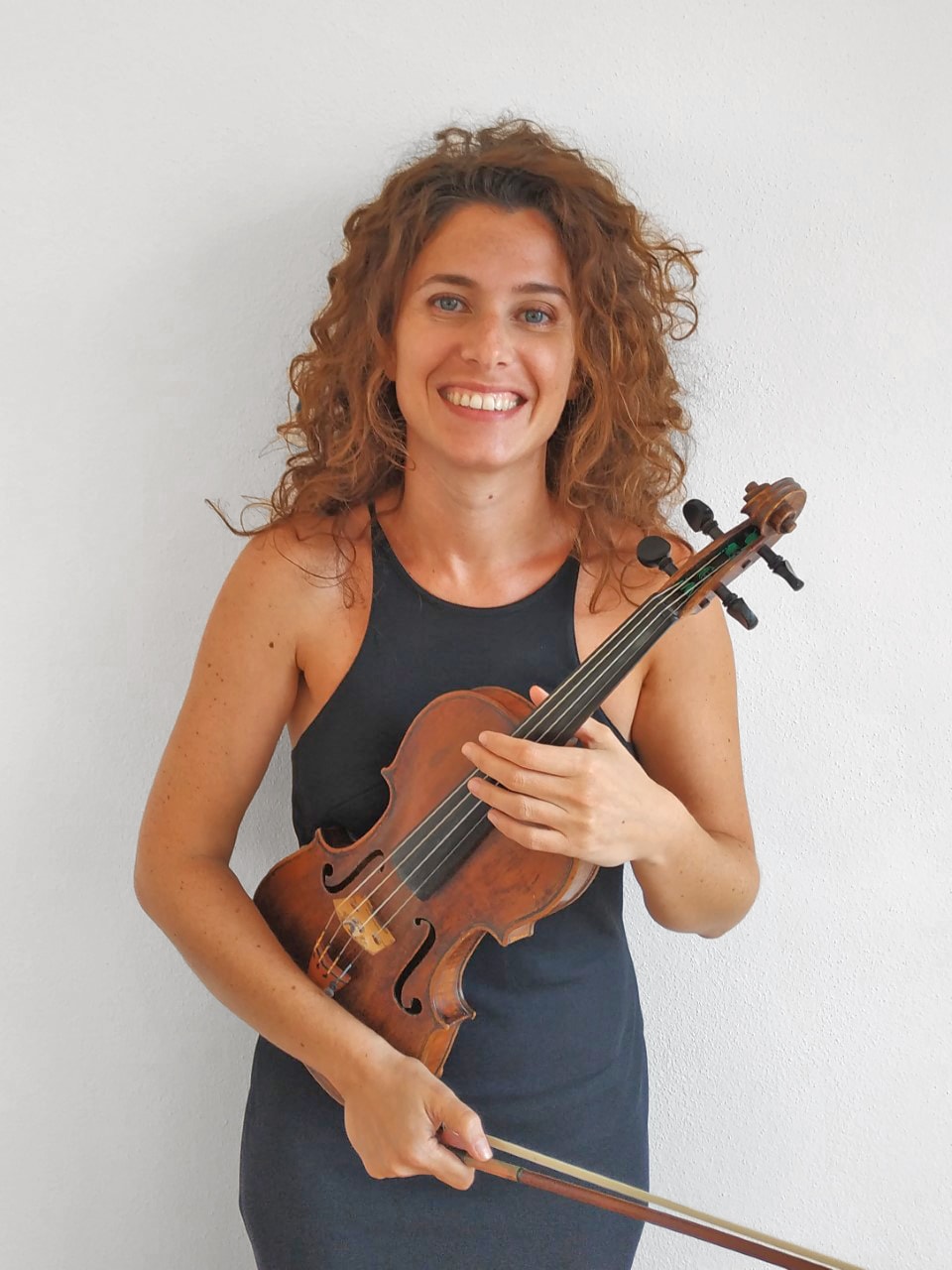 Tania Mazzetti holds her violin
