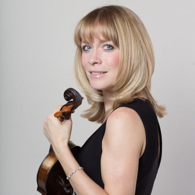 Katalin Varnagy holds her violin