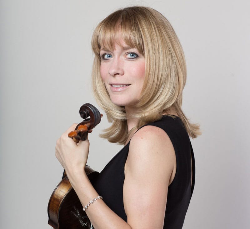 Katalin Varnagy holds her violin
