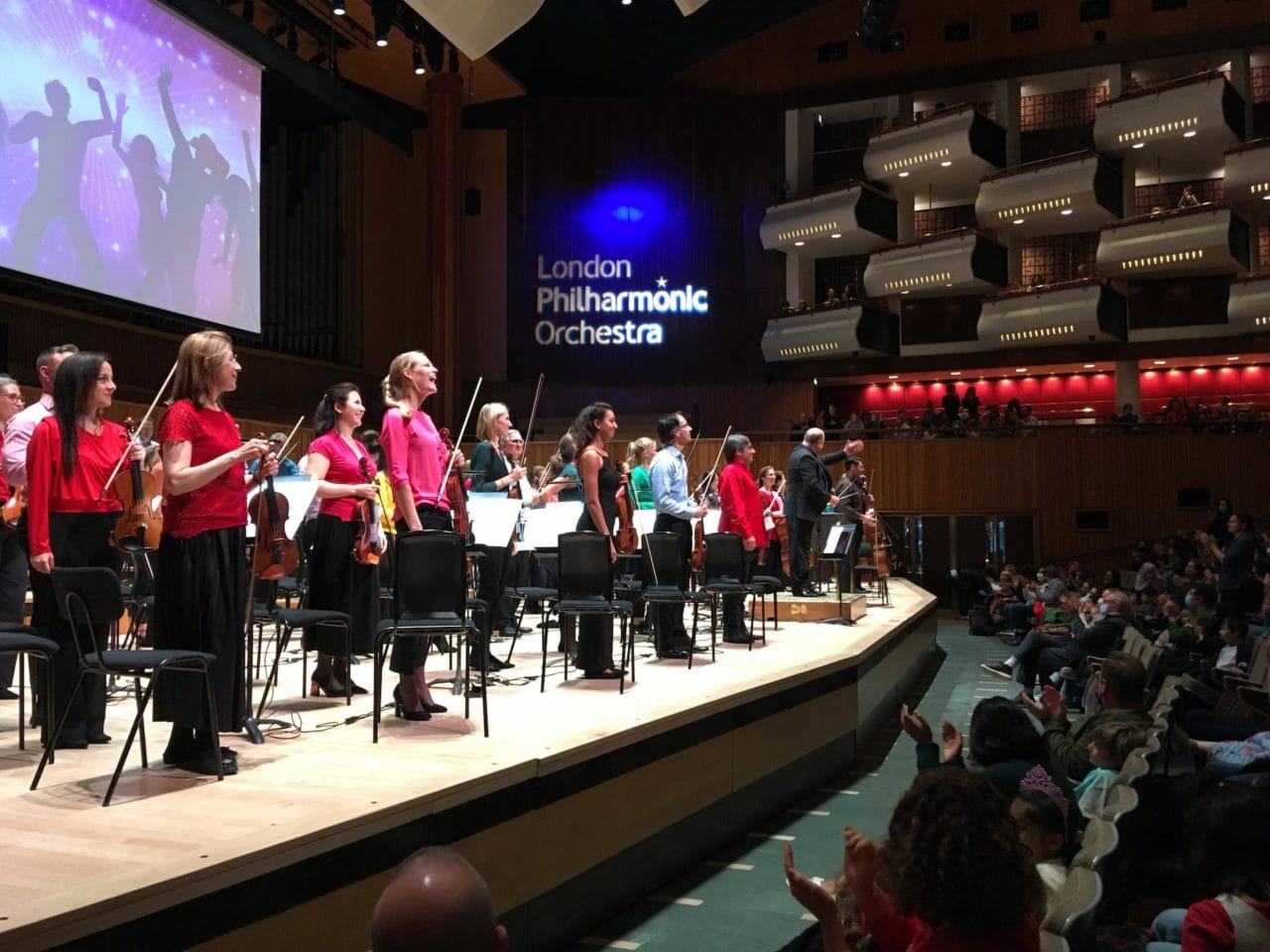 London Philharmonic Orchestra take a bow onstage