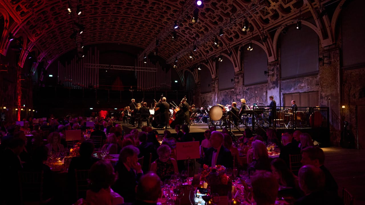The Orchestra playing at the LPO Gala 2023 at Battersea Arts Centre.