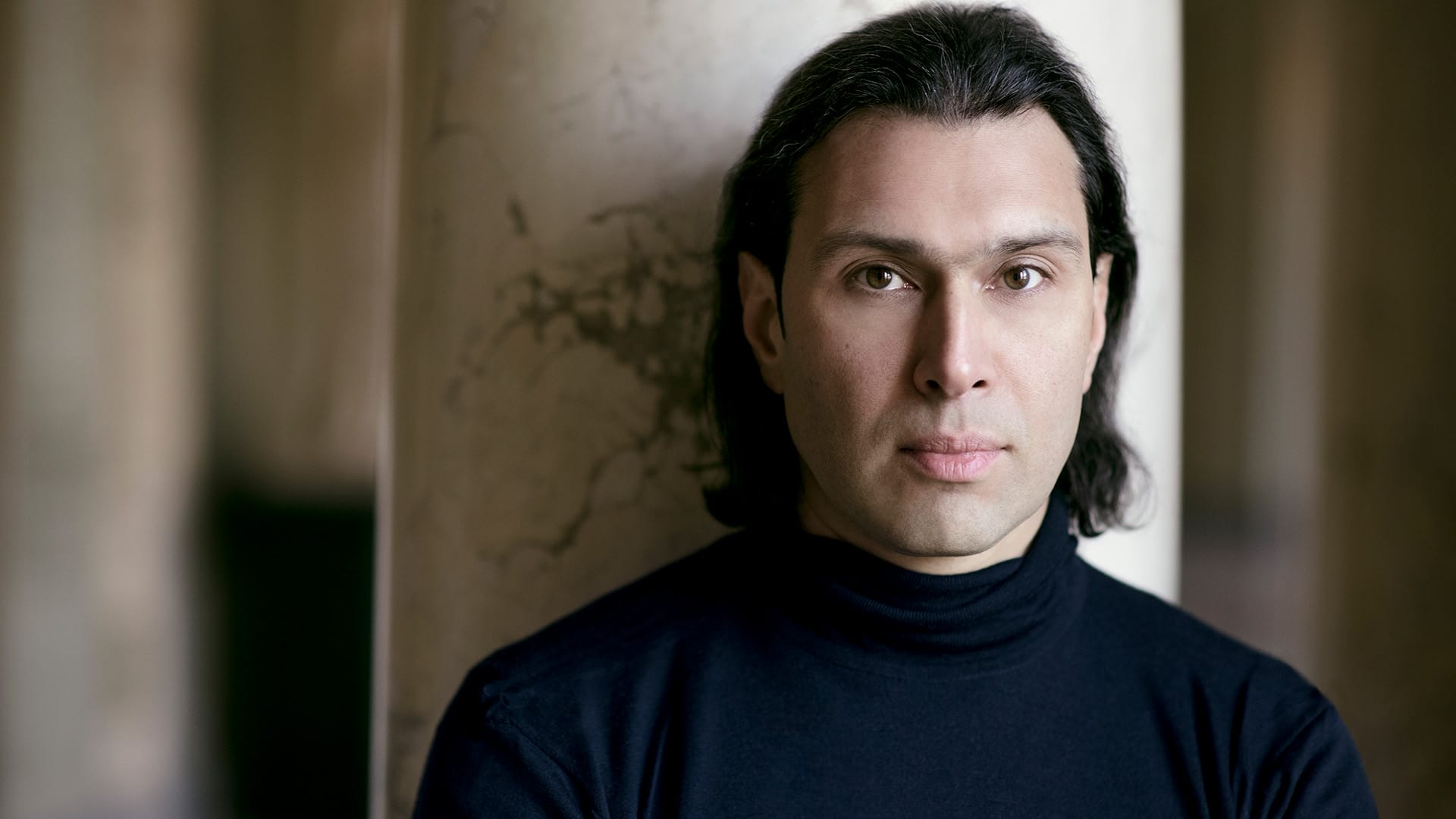 Conductor Vladimir Jurowski in a black turtleneck, semi close-up
