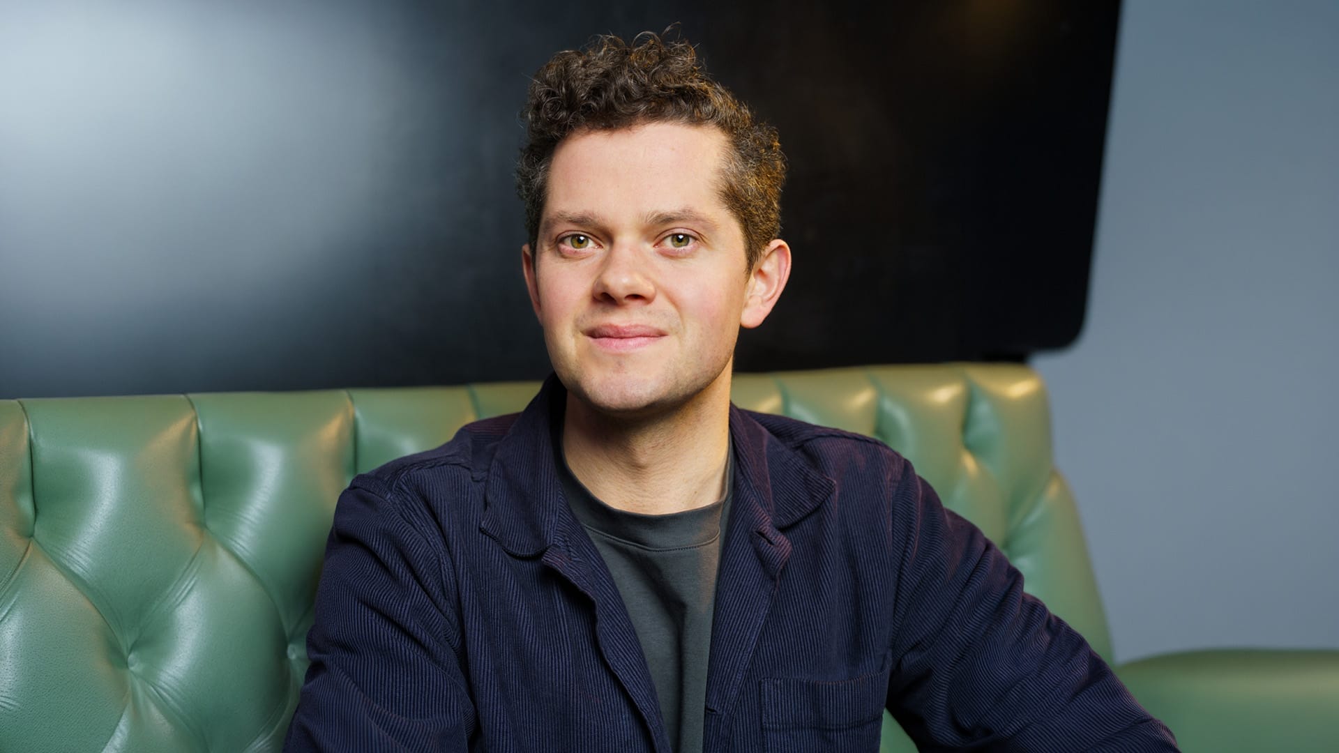 Tenor James Way, a man with dark hair, artistic portrait.