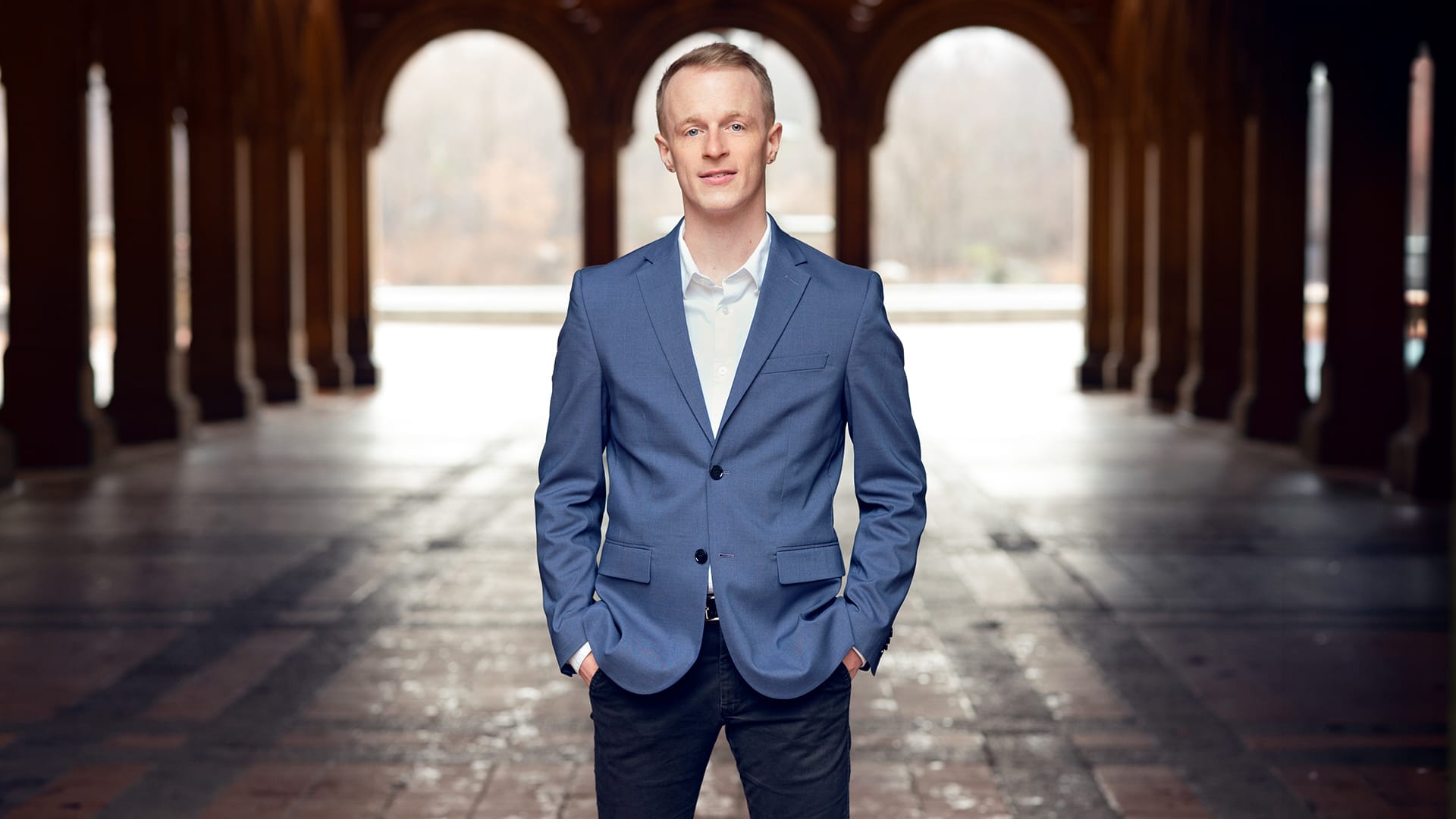 Bass-baritone Nathaniel Sullivan, a man with short hair, wearing a formal suit, formal portrait.