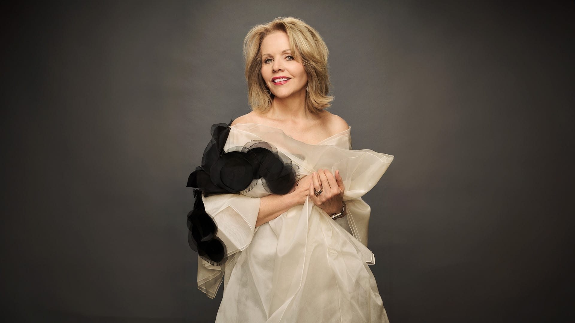 Soprano Renée Fleming, a woman with blonde hair, formal portrait.
